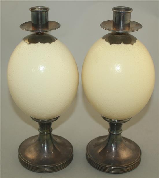 Anthony Redmile. A pair of ostrich egg candlesticks, 11in.